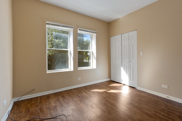 unfurnished bedroom featuring wood-type flooring