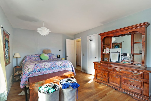 bedroom featuring light hardwood / wood-style floors