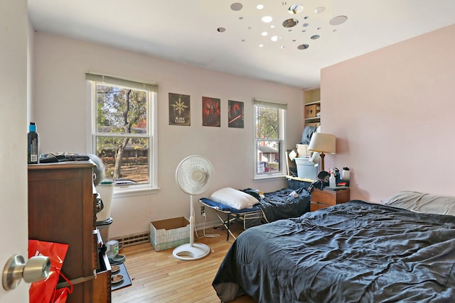 bedroom featuring light hardwood / wood-style flooring