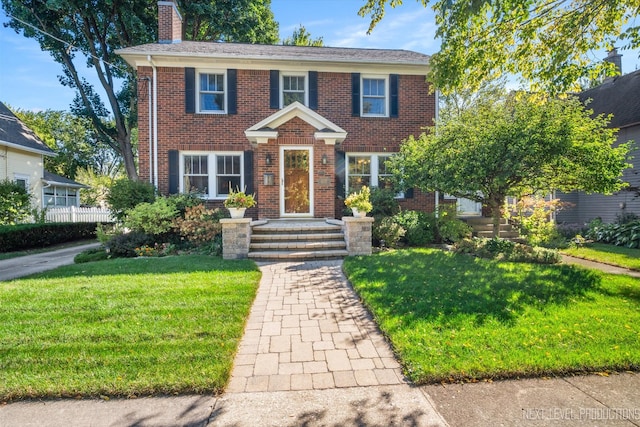 view of front of home with a front lawn