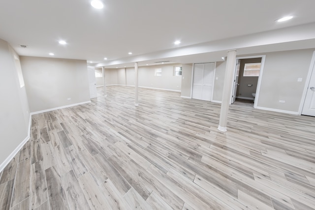 basement with light wood-type flooring