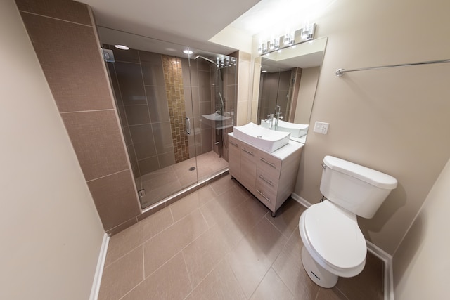 bathroom featuring vanity, toilet, and walk in shower