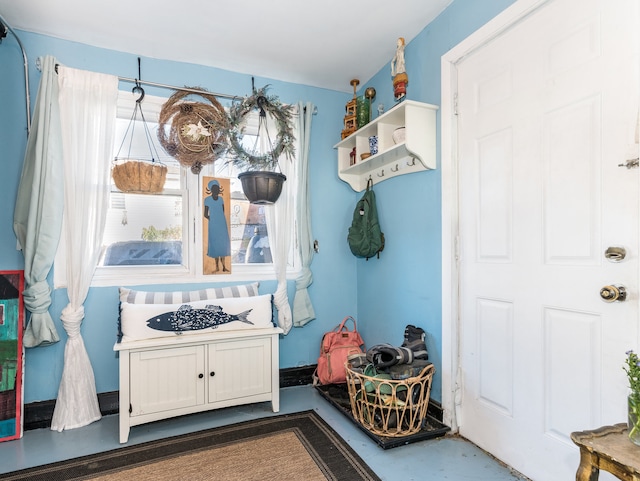 mudroom featuring concrete flooring