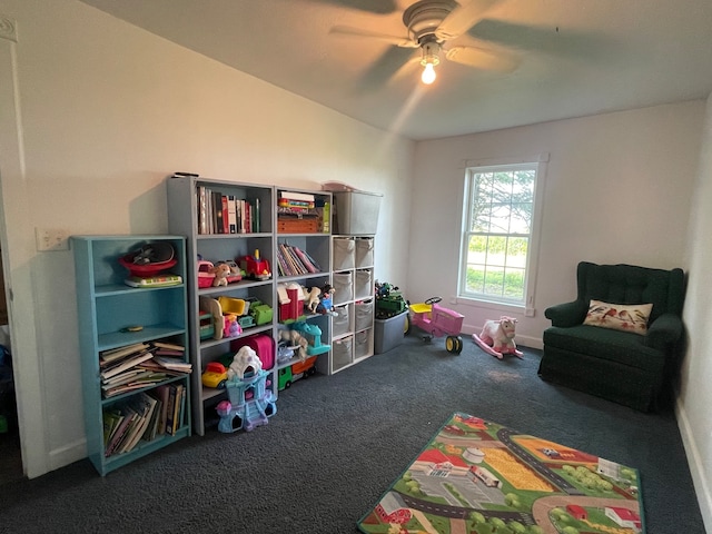 game room with ceiling fan, lofted ceiling, and carpet