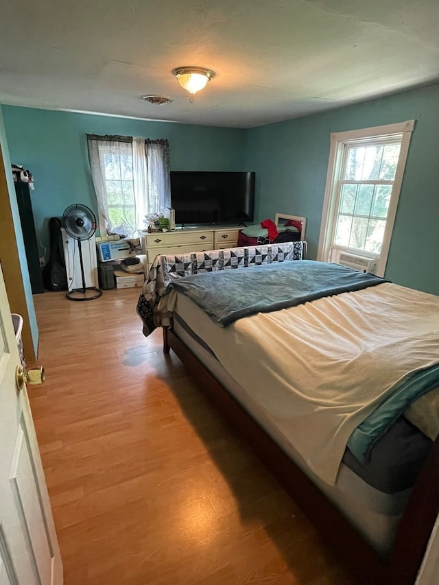 bedroom featuring light hardwood / wood-style floors