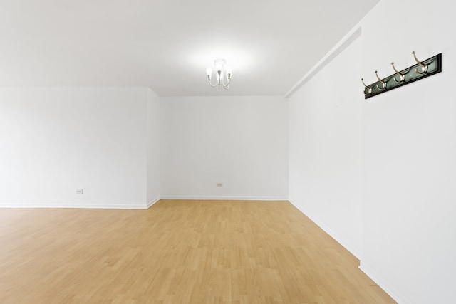 unfurnished room with light hardwood / wood-style flooring