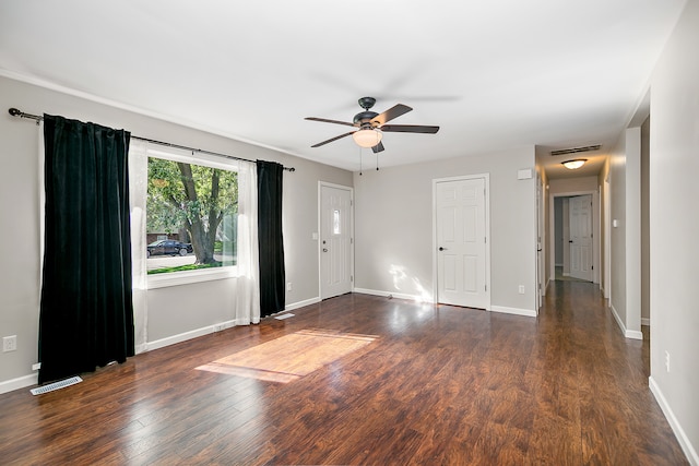 unfurnished room featuring dark hardwood / wood-style flooring and ceiling fan