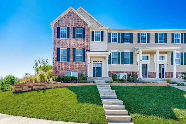 view of front of home with a front lawn