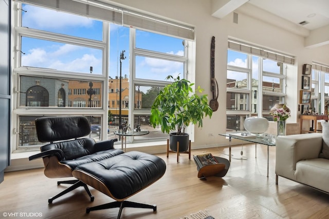 sunroom / solarium with beamed ceiling