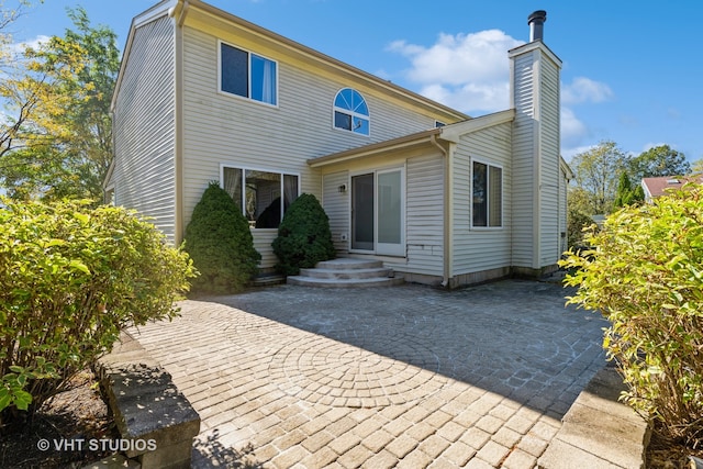 view of front of home with a patio area