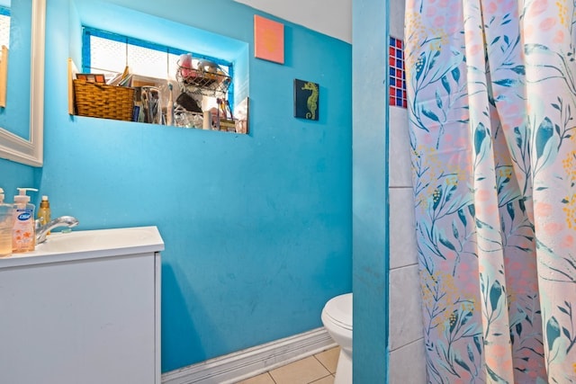 4035 W Marquette Rd, Chicago, IL 60629 - full bathroom with toilet, tile patterned floors, vanity, and a shower with shower curtain