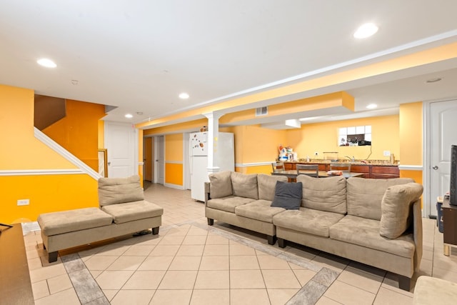 4035 W Marquette Rd, Chicago, IL 60629 - living room featuring inlaid floor details, recessed lighting, light tile patterned floors, and baseboards
