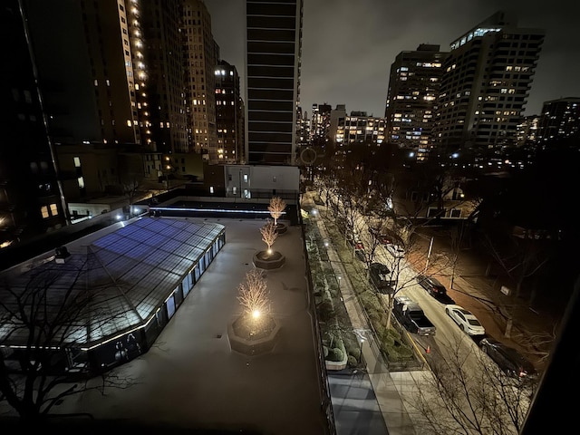 view of balcony at twilight