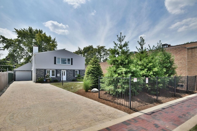 view of front of property featuring a garage