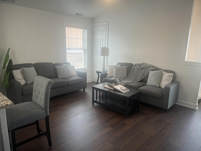 living room featuring dark hardwood / wood-style floors