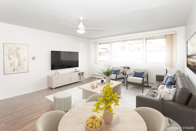 living room with ceiling fan and wood-type flooring