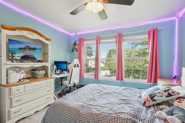 carpeted bedroom with ceiling fan