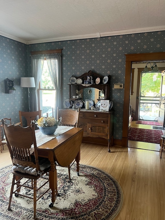 kitchen featuring dishwasher, a kitchen island, and light tile patterned floors