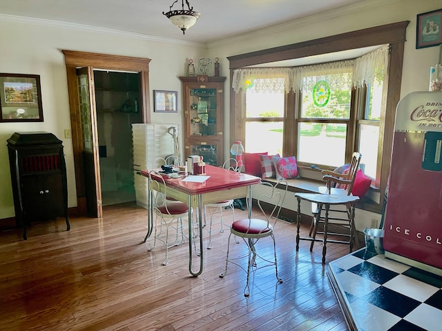 office area featuring crown molding, french doors, and hardwood / wood-style flooring