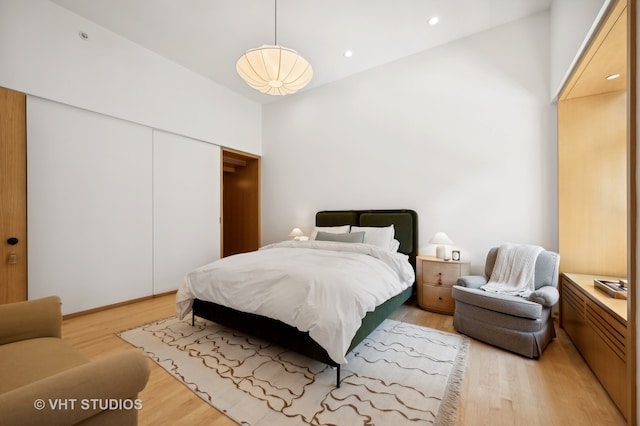 bedroom featuring light wood-type flooring