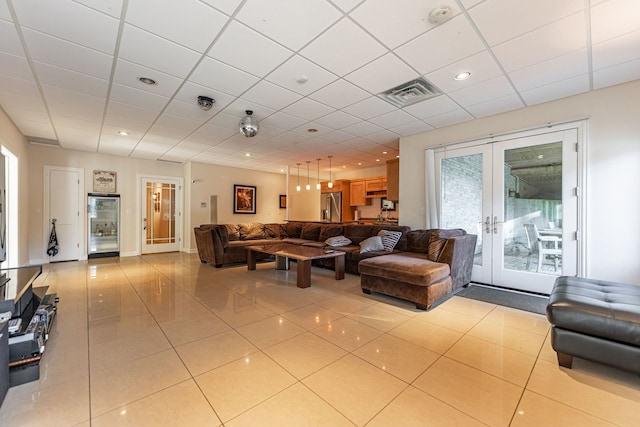 tiled living room with french doors