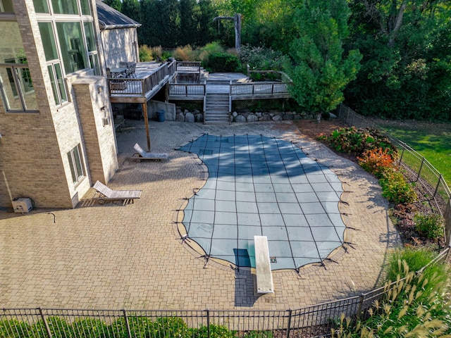 view of swimming pool featuring a patio