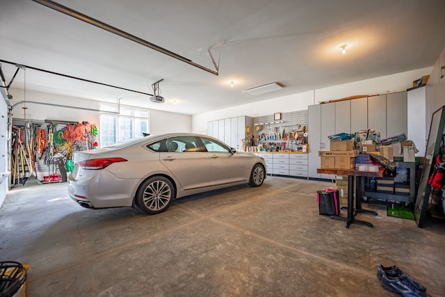 garage featuring a garage door opener