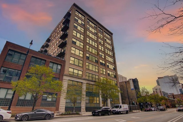 view of outdoor building at dusk