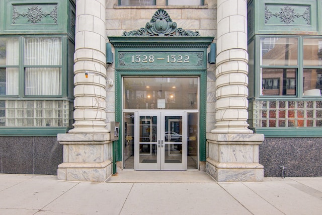 property entrance featuring french doors