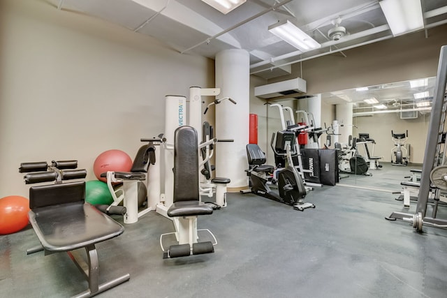 workout area featuring a wall mounted AC