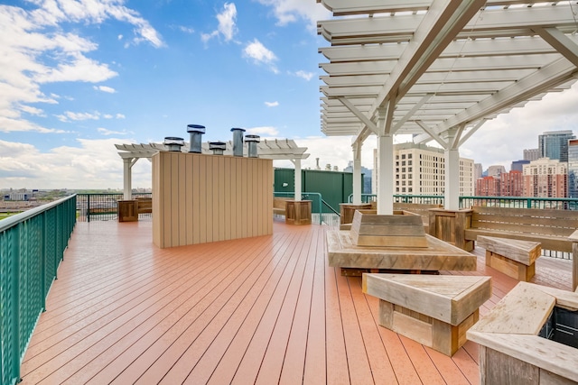 wooden deck featuring a pergola