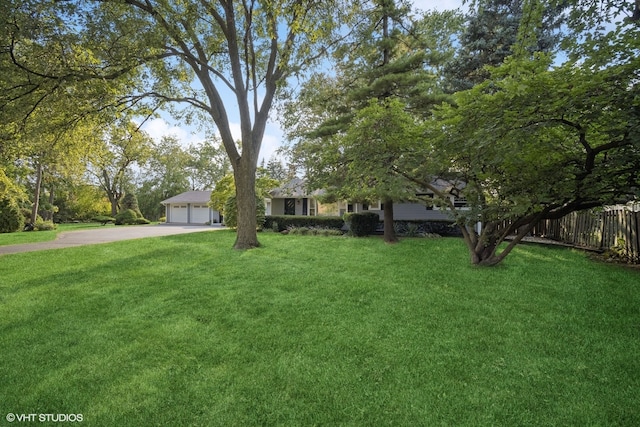 view of yard featuring a garage