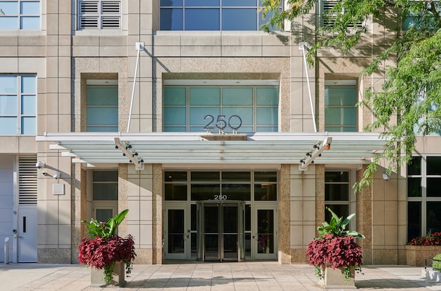 property entrance featuring french doors