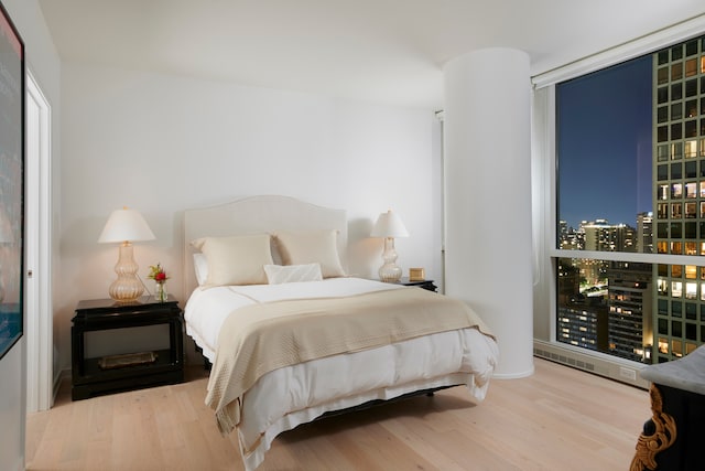 bedroom featuring light hardwood / wood-style flooring