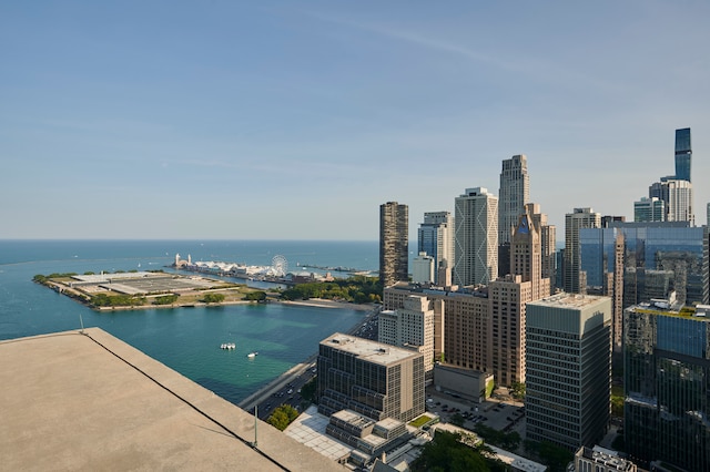 property's view of city featuring a water view