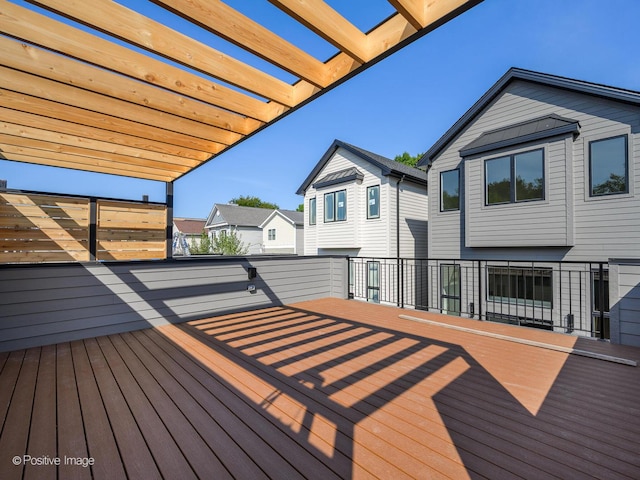 wooden terrace with a pergola