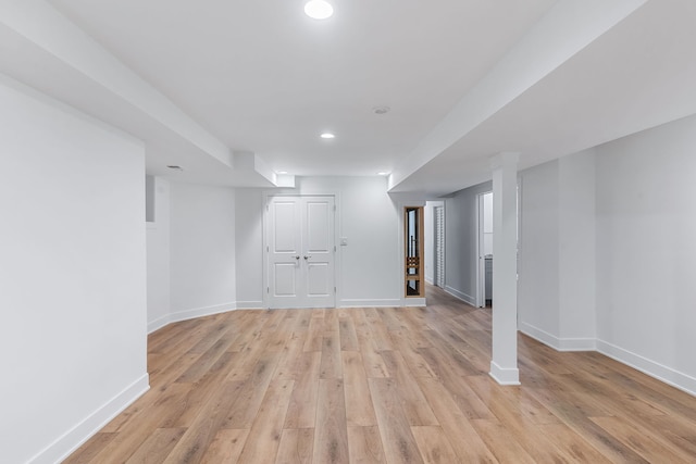 basement with light wood-type flooring