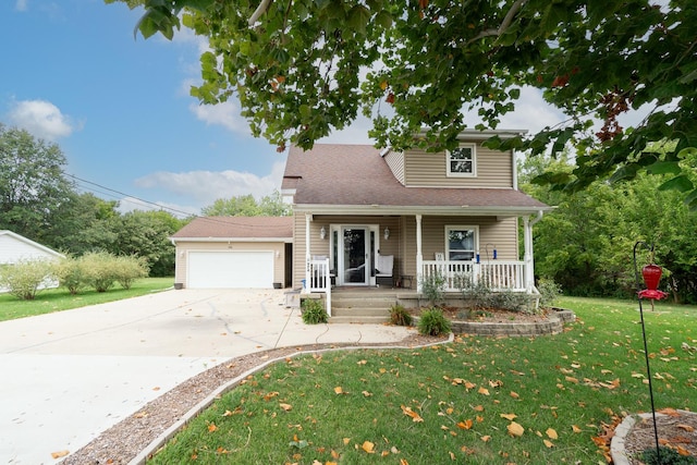 view of front facade featuring a porch, a garage, and a front lawn