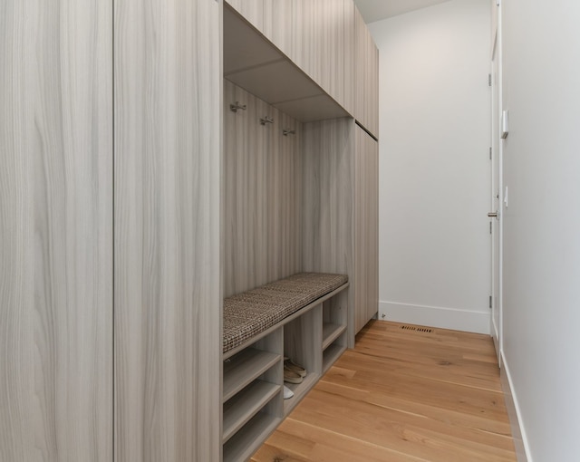 mudroom with light wood-type flooring