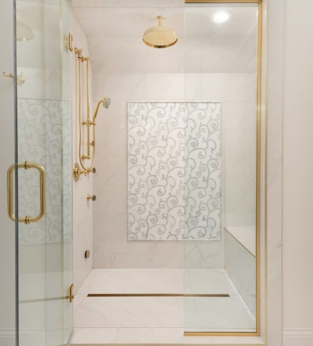 bathroom with an enclosed shower