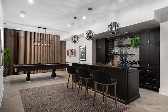 bar featuring pendant lighting, pool table, and light parquet floors