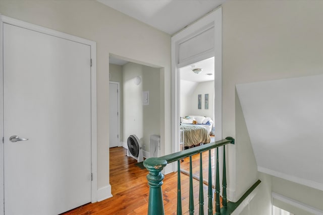 hallway featuring hardwood / wood-style flooring