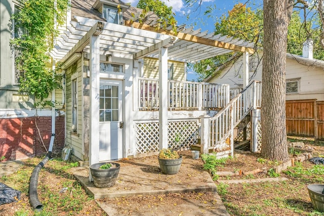 view of outdoor structure with a pergola