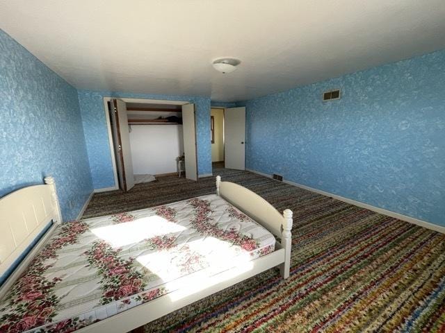 17580 1200 E St, Wyanet, IL 61379 - carpeted bedroom featuring wallpapered walls