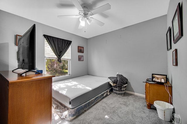 bedroom featuring ceiling fan and carpet floors