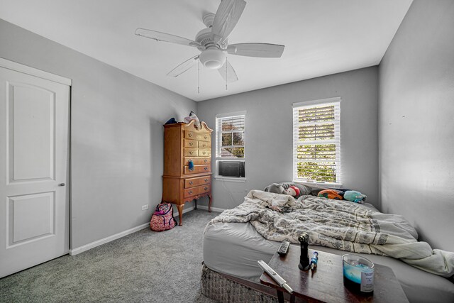 bedroom featuring ceiling fan and carpet floors