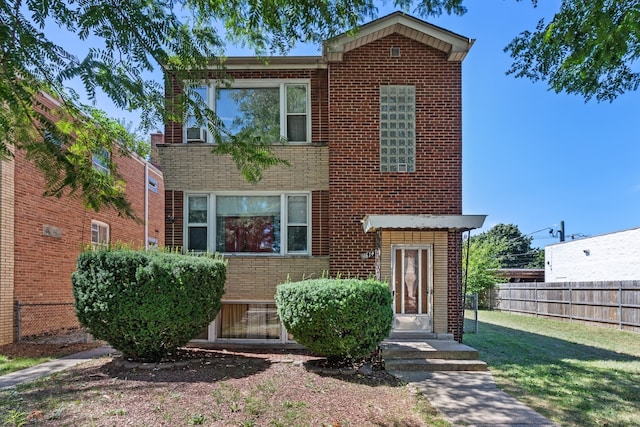 view of front of home with a front yard