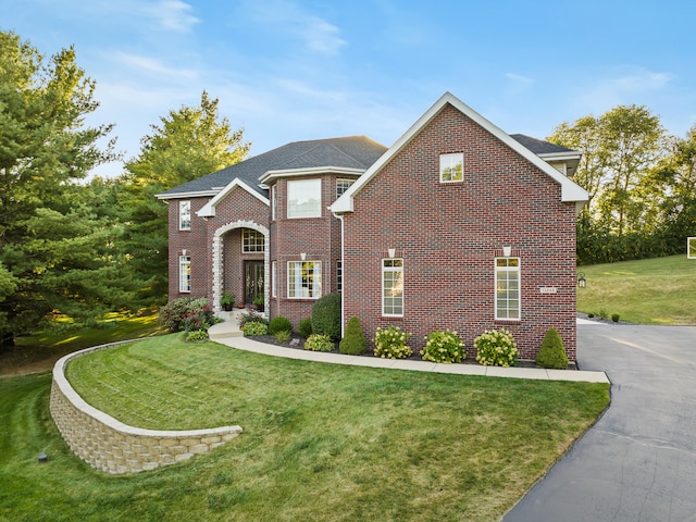 view of front of property with a front lawn