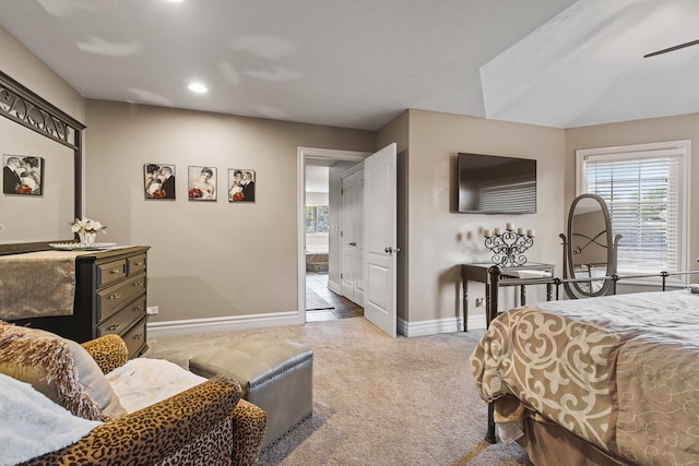 bedroom with light colored carpet