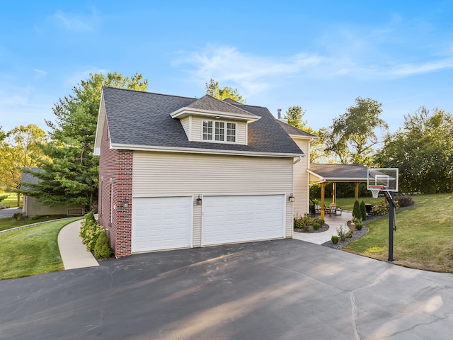 view of property exterior featuring a garage and a yard